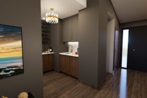 Modern hallway with wood flooring, dark cabinets, a small wet bar, and a chandelier near a black front door.